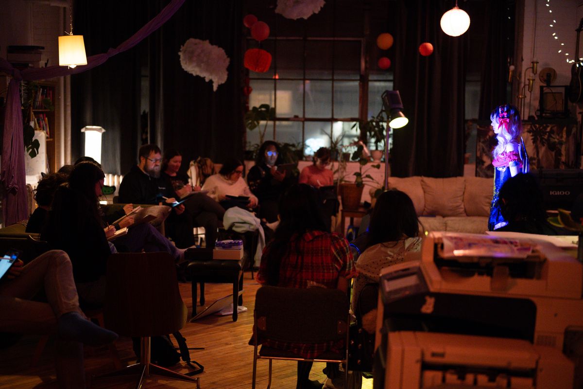 Attendees drawing at Magical Girl event