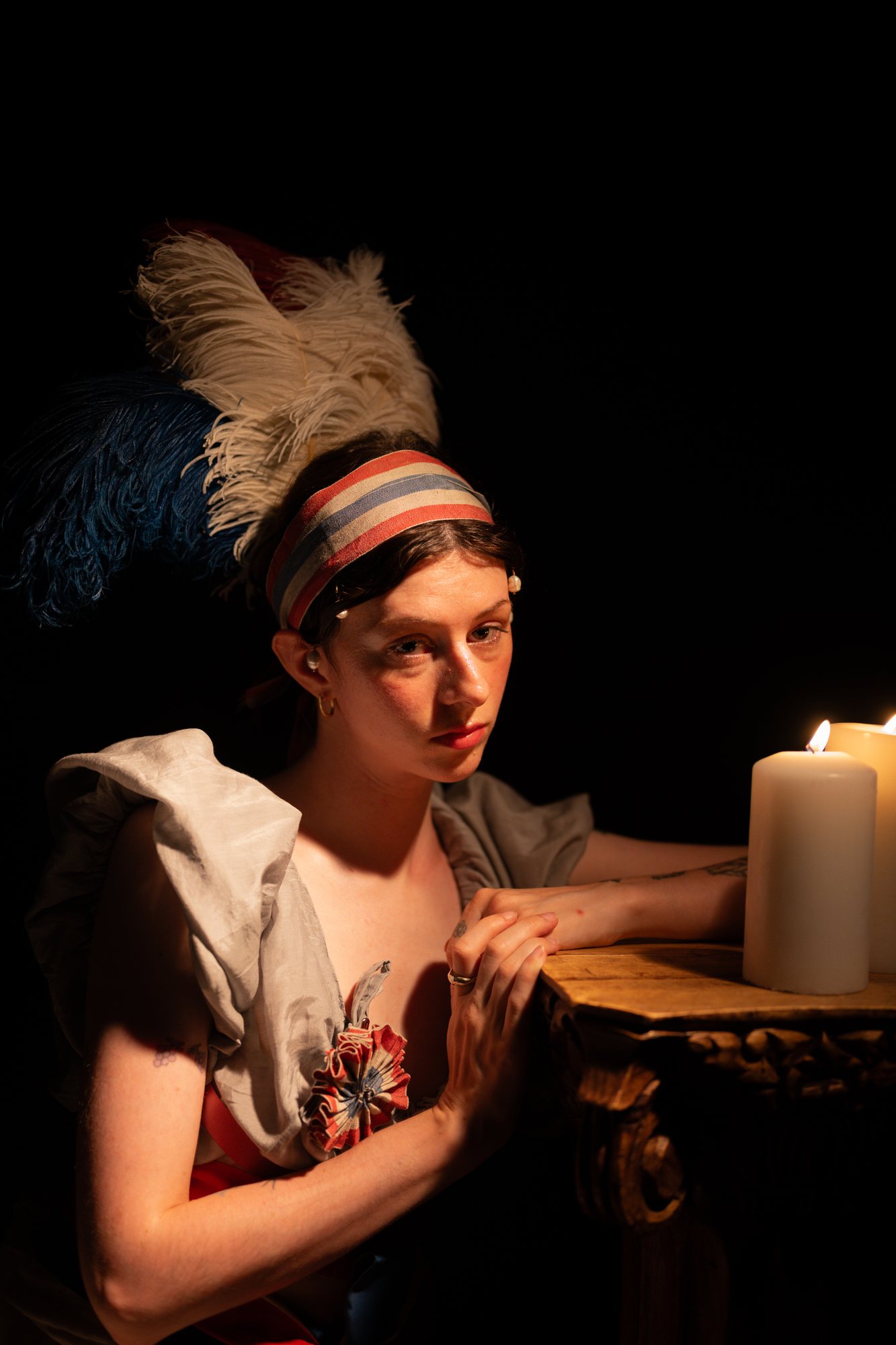 French Revolution photoshoot, model by candlelight
