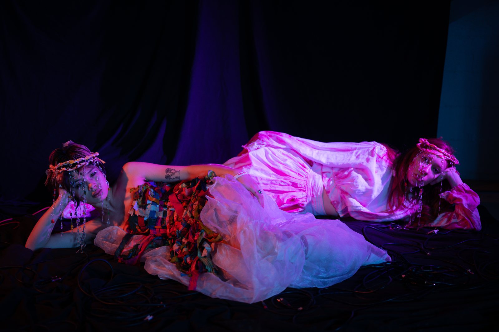 Post Apocalypse, model reclining in pink light