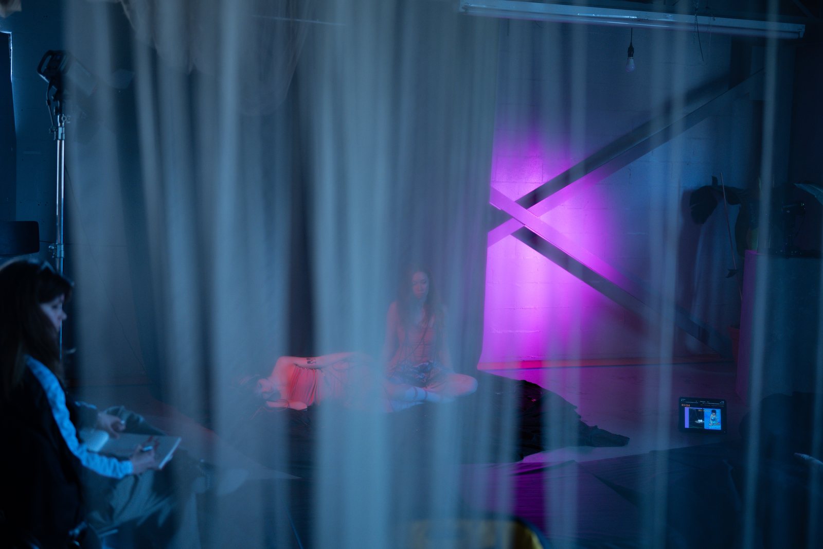 Post Apocalypse, the set glimpsed through sheer curtains